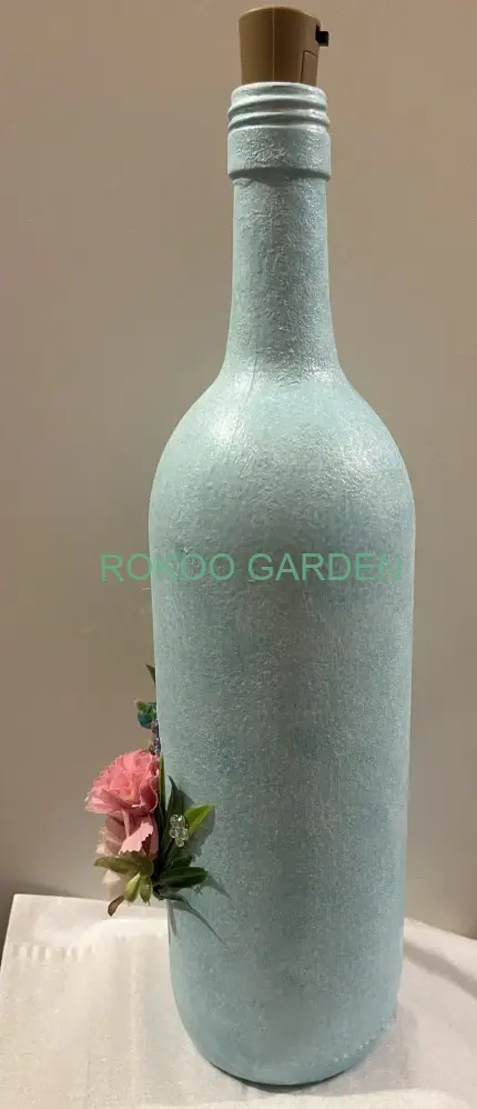 Dekorační lahev „Tyrkysové světlo květin“