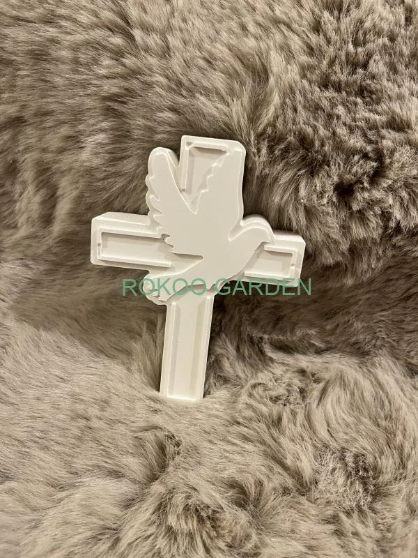 Odlitek kříž s holubicí 
